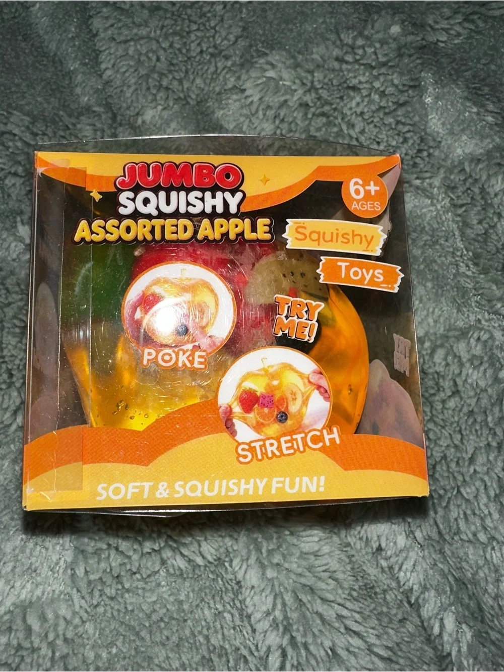 Big coconut oil squishy with embedded fruit charms.